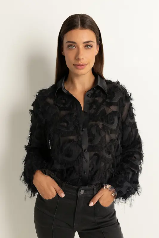 Blouse met veertjes