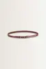 Smalle riem met goudkleurige bit-gesp