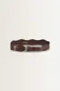 Leren riem met golvend patroon