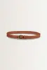 Leren riem met metalen details
