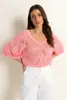 Luchtige knit met vlindermouwen