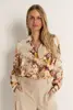Soepelvallende blouse marmerprint