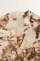 Soepelvallende blouse marmerprint