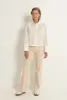 Flared jeans met gevlochten tailleaccent