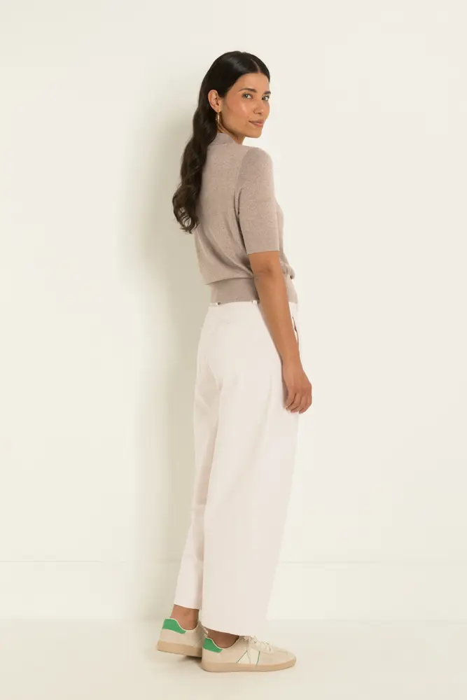 Gebreide polo met metallic garen