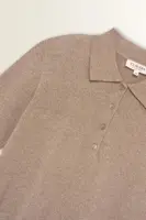 Gebreide polo met metallic garen