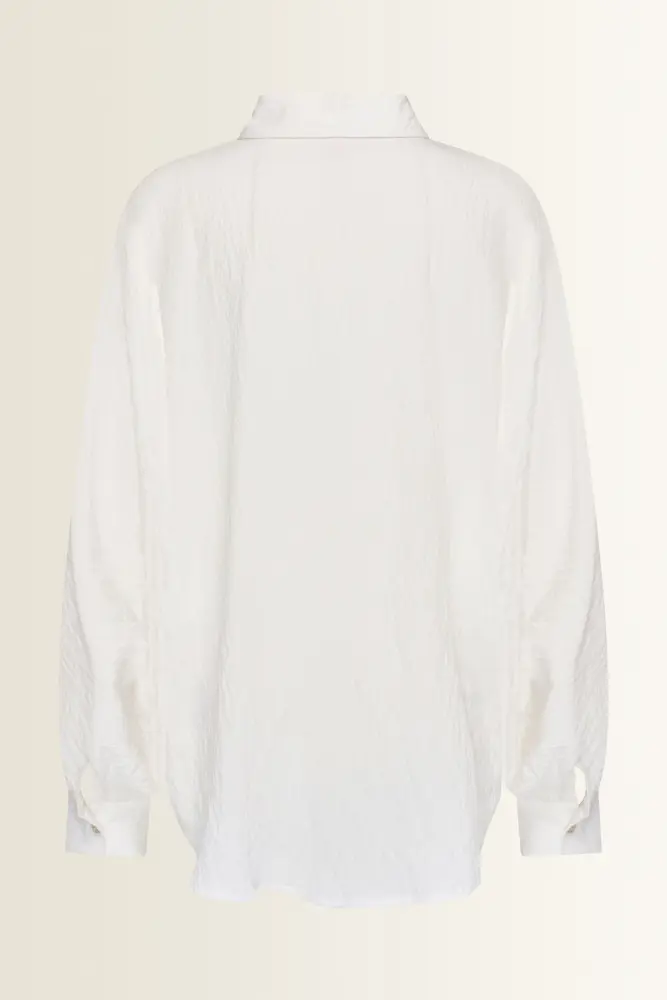 Oversized blouse met volumemouwen